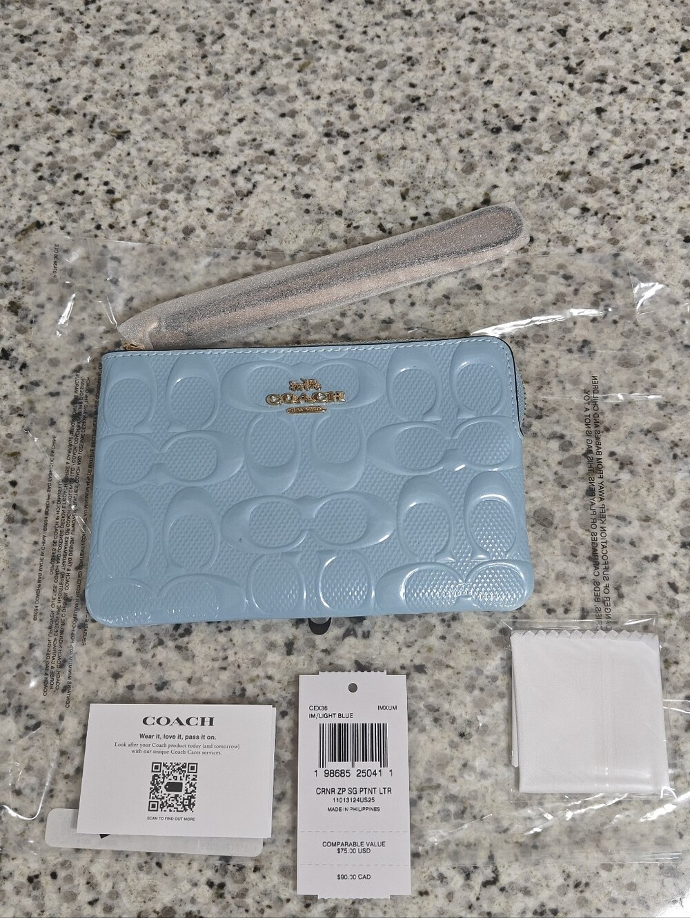 Coach Corner Zip WristletIn Signature Leather With Charm (Light blue, patent le
